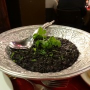 Risotto Nero - An ancient Venetian tradition of Arborio rice prepared with sepia and its ink